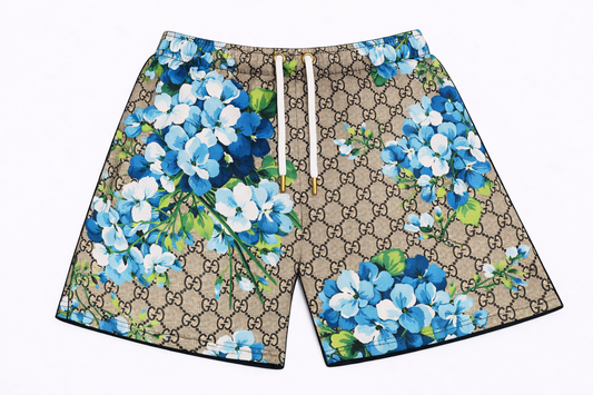 ASYLUM CO. GUCCI MONOGRAM FLORAL MOTIF SATIN MESH SHORTS
